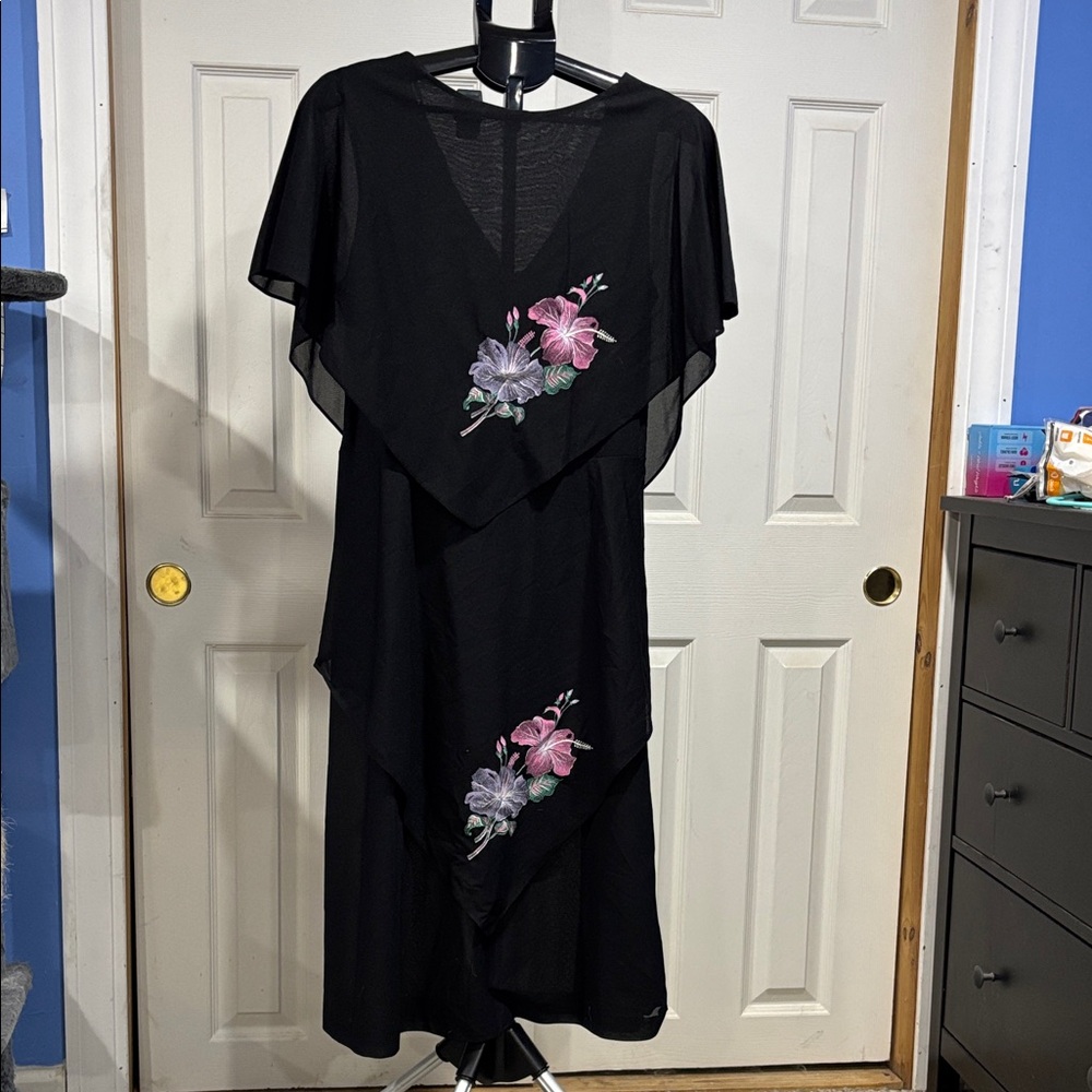 Elegant Black Dress with Floral Accents